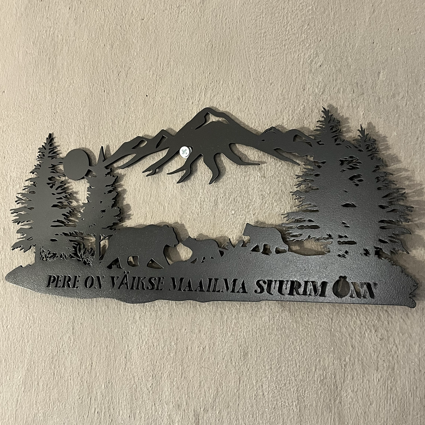 Bear family with mountains